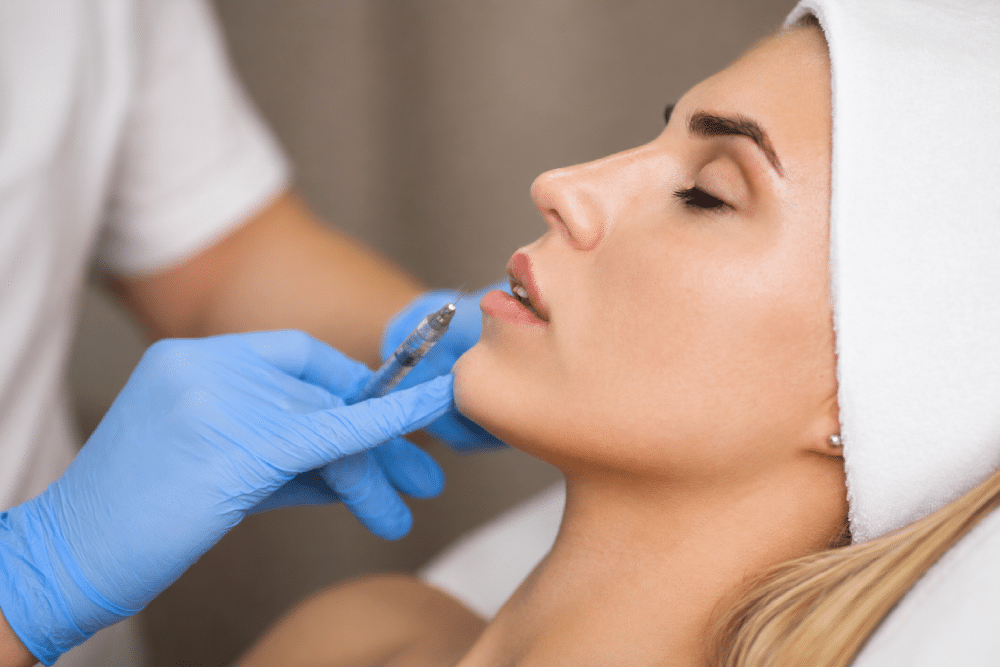 Beautiful woman has striking features with help from dermal filler injections.